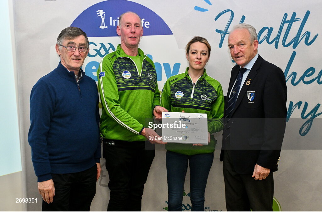 14 December 2023; Eslin, Leitrim, representatives Sean Reynolds and Lisa Mulligan is presented their Silver Healthy Club award by Connacht GAA secretary John Prenty, left, and Connacht GAA Council president John Murphy, right, during the Irish Life Connacht GAA Healthy Clubs recognition event at the Connacht GAA Centre of Excellence in Bekan, Mayo. Photo by Ben McShane/Sportsfile