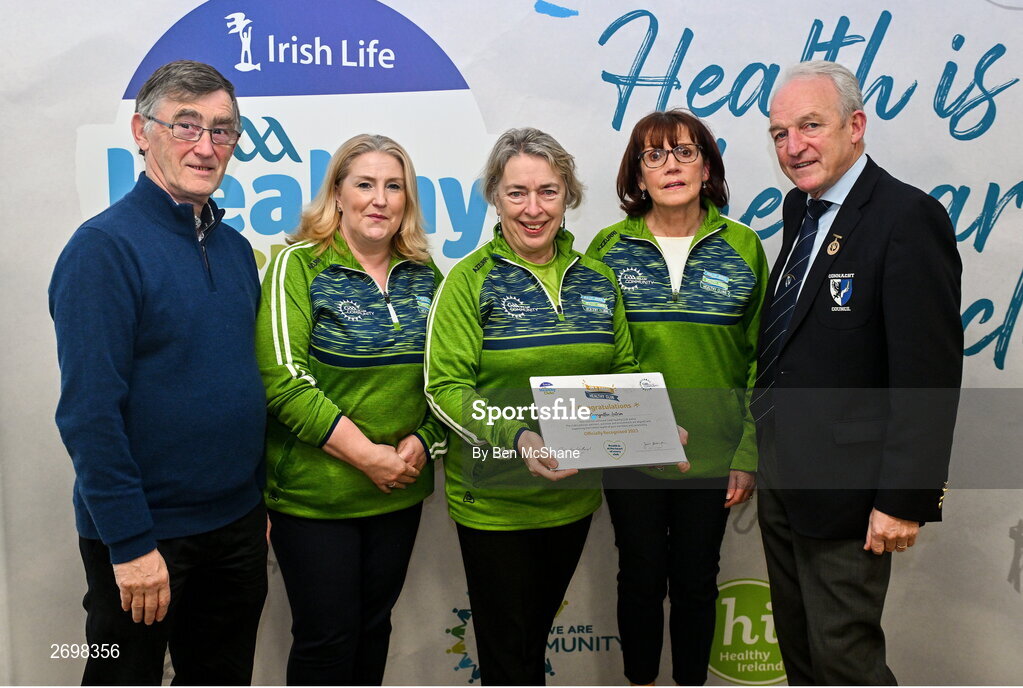 14 December 2023; Carrigallen, Leitrim, representatives Bernie Mulligan Dolan, Antoinette and Ann-Marie is presented their Gold Healthy Club award by Connacht GAA secretary John Prenty, left, and Connacht GAA Council president John Murphy, right, during the Irish Life Connacht GAA Healthy Clubs recognition event at the Connacht GAA Centre of Excellence in Bekan, Mayo. Photo by Ben McShane/Sportsfile