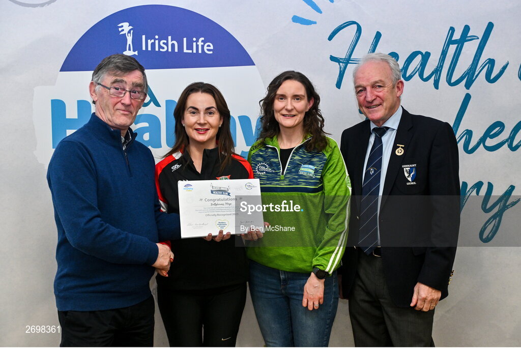 14 December 2023; Ballyhaunis, Mayo, representatives Lisa McConn and Alma Gallagher is presented their Silver Healthy Club award by Connacht GAA secretary John Prenty, left, and Connacht GAA Council president John Murphy, right, during the Irish Life Connacht GAA Healthy Clubs recognition event at the Connacht GAA Centre of Excellence in Bekan, Mayo. Photo by Ben McShane/Sportsfile