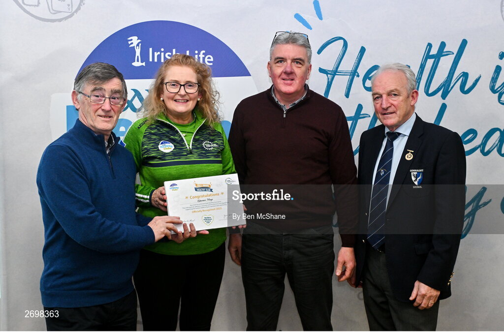 14 December 2023; Kilmeena, Mayo, representatives Noreen Johnston and John McDonald is presented their Gold Healthy Club award by Connacht GAA secretary John Prenty, left, and Connacht GAA Council president John Murphy, right, during the Irish Life Connacht GAA Healthy Clubs recognition event at the Connacht GAA Centre of Excellence in Bekan, Mayo. Photo by Ben McShane/Sportsfile