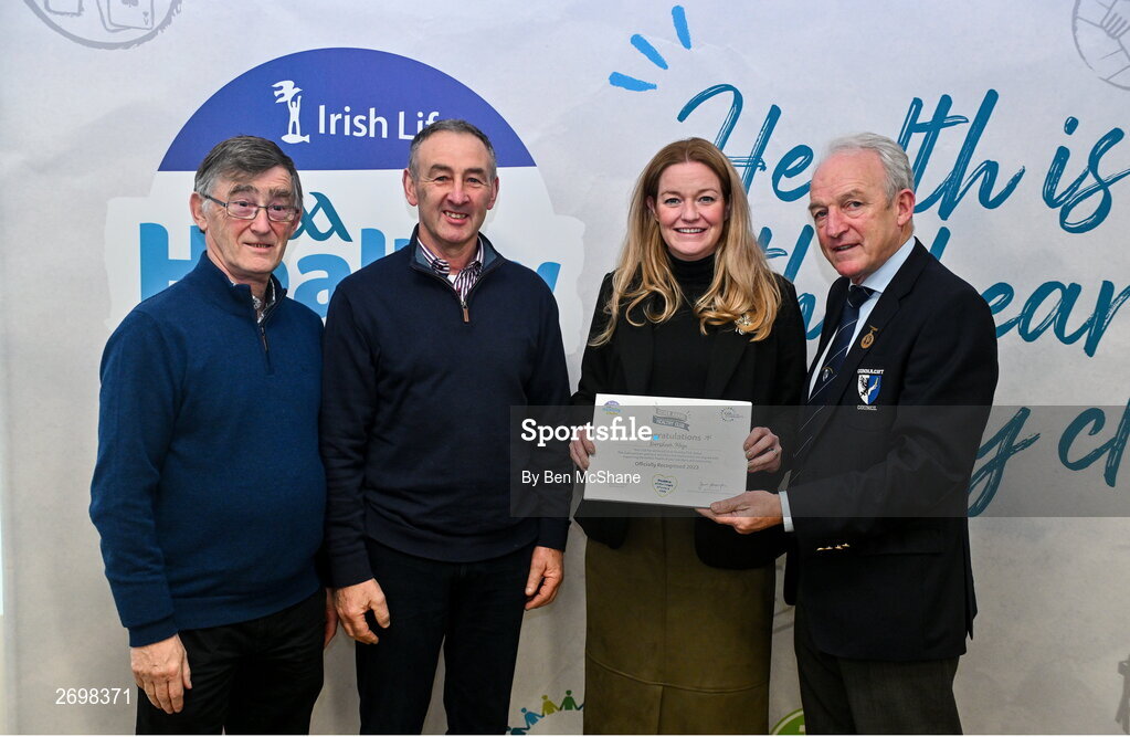 14 December 2023; Burrishoole, Mayo, representatives Clara McGorman and John Pat Sheridan is presented their Silver Healthy Club award by Connacht GAA secretary John Prenty, left, and Connacht GAA Council president John Murphy, right, during the Irish Life Connacht GAA Healthy Clubs recognition event at the Connacht GAA Centre of Excellence in Bekan, Mayo. Photo by Ben McShane/Sportsfile