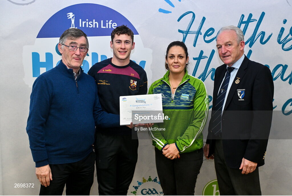 14 December 2023; Ballinrobe, Mayo, representatives Evan Reaney and Martina McCormack is presented their Foundation Healthy Club award by Connacht GAA secretary John Prenty, left, and Connacht GAA Council president John Murphy, right, during the Irish Life Connacht GAA Healthy Clubs recognition event at the Connacht GAA Centre of Excellence in Bekan, Mayo. Photo by Ben McShane/Sportsfile