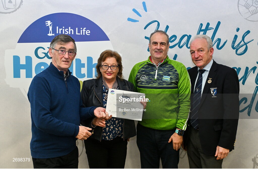 14 December 2023; St Aiden's, Roscommon, representatives Mary Owens and Stephen Harney is presented their Silver Healthy Club award by Connacht GAA secretary John Prenty, left, and Connacht GAA Council president John Murphy, right, during the Irish Life Connacht GAA Healthy Clubs recognition event at the Connacht GAA Centre of Excellence in Bekan, Mayo. Photo by Ben McShane/Sportsfile