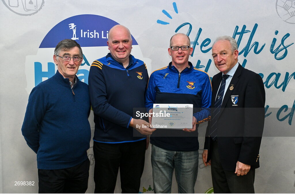 14 December 2023; Owenmore Gaels, Sligo, representatives John Hunt and Tommy Nellany is presented their Foundation Healthy Club award by Connacht GAA secretary John Prenty, left, and Connacht GAA Council president John Murphy, right, during the Irish Life Connacht GAA Healthy Clubs recognition event at the Connacht GAA Centre of Excellence in Bekan, Mayo. Photo by Ben McShane/Sportsfile