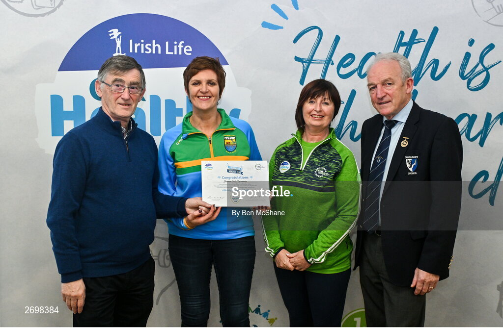 14 December 2023; Shannon Gaels, Roscommon, representatives Nuala O'Beirne and Della Beirne is presented their Foundation Healthy Club award by Connacht GAA secretary John Prenty, left, and Connacht GAA Council president John Murphy, right, during the Irish Life Connacht GAA Healthy Clubs recognition event at the Connacht GAA Centre of Excellence in Bekan, Mayo. Photo by Ben McShane/Sportsfile