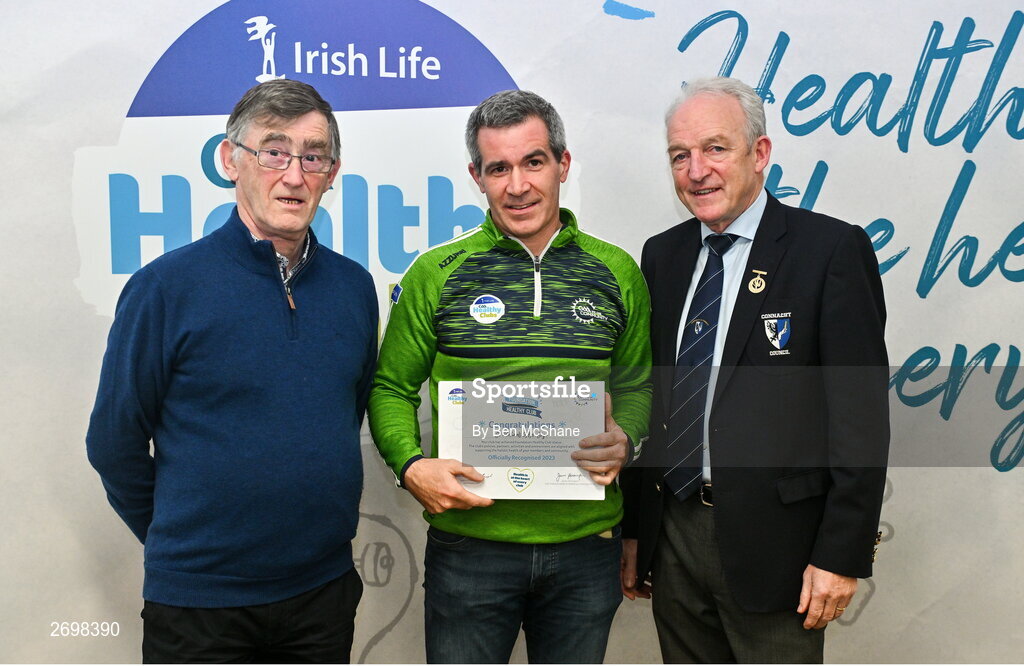 14 December 2023; St Michael's, Sligo, representative Trevor Coen is presented their Foundation Healthy Club award by Connacht GAA secretary John Prenty, left, and Connacht GAA Council president John Murphy, right, during the Irish Life Connacht GAA Healthy Clubs recognition event at the Connacht GAA Centre of Excellence in Bekan, Mayo. Photo by Ben McShane/Sportsfile