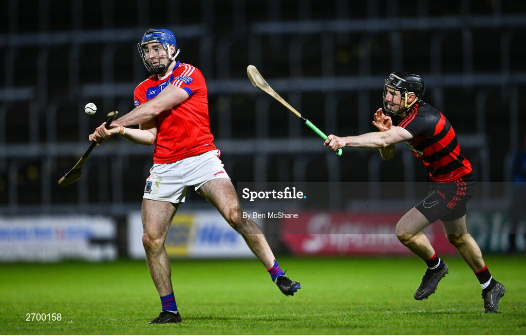 16 December 2023; Conor Cooney of St Thomas' scores a point despite the attention of Barry Coughlin of Ballygunner during the AIB GAA Hurling All-Ireland Senior Club Championship semi-final match between St Thomas' of Galway and Ballygunner of Waterford at Laois Hire O'Moore Park in Portlaoise, Laois. Photo by Ben McShane/Sportsfile