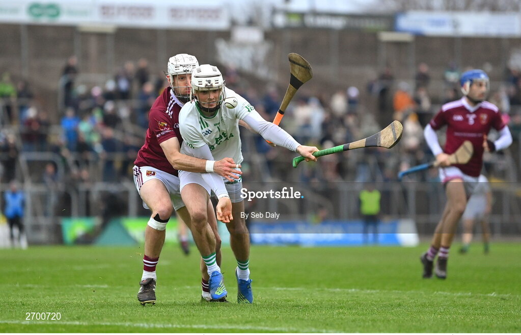 17 December 2023; Paddy Butler of O’Loughlin Gaels in action against Martin Burke of Ruairí Óg Cushendall during the AIB GAA Hurling All-Ireland Club Championship semi-final match between O'Loughlin Gaels, Kilkenny, and Ruairí Óg Cushendall, Antrim, at Páirc Tailteann in Navan, Meath. Photo by Seb Daly/Sportsfile