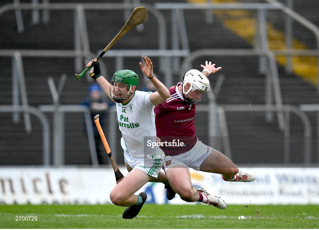 17 December 2023; Luke Hogan of O’Loughlin Gaels is fouled by Paddy Burke of Ruairí Óg Cushendall during the AIB GAA Hurling All-Ireland Club Championship semi-final match between O'Loughlin Gaels, Kilkenny, and Ruairí Óg Cushendall, Antrim, at Páirc Tailteann in Navan, Meath. Photo by Seb Daly/Sportsfile