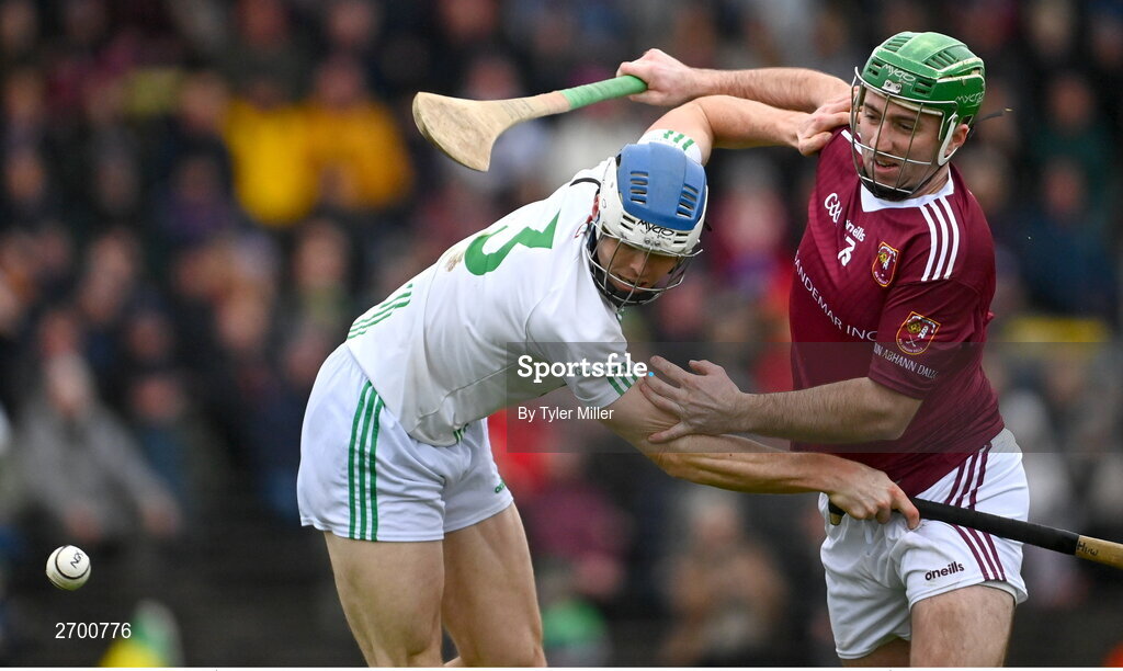 17 December 2023; Seán McAfee of Ruairí Óg Cushendall and Huw Lawlor of O’Loughlin Gaels battle for possession during the AIB GAA Hurling All-Ireland Club Championship semi-final match between O'Loughlin Gaels, Kilkenny, and Ruairí Óg Cushendall, Antrim, at Páirc Tailteann in Navan, Meath. Photo by Tyler Miller/Sportsfile
