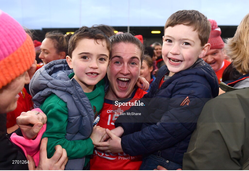 17 December 2023; Fionnuala O'Driscoll of O'Donovan Rossa celebrates with her nephews Fergal, left, and Darragh after the Currentaccount.ie LGFA All-Ireland Junior Club Championship final match between Claremorris of Mayo and O'Donovan Rossa of Cork at Parnell Park in Dublin. Photo by Ben McShane/Sportsfile