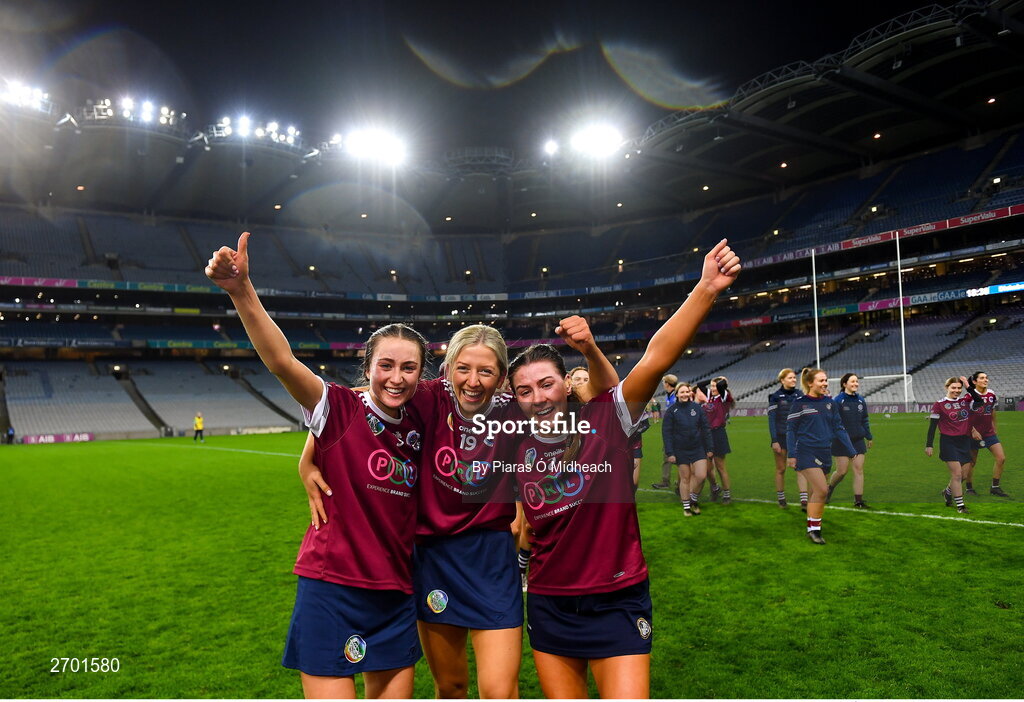 17 December 2023; Dicksboro players, from left, Aobha O’Gorman, Bronagh Doheny and Jane Cass celebrate after their side's victory in the AIB Camogie All-Ireland Senior Club Championship final match between Dicksboro of Kilkenny and Sarsfields of Galway at Croke Park in Dublin. Photo by Piaras Ó Mídheach/Sportsfile