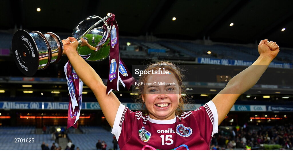 17 December 2023; Dicksboro captain Jenny Clifford celebrates with the Bill & Agnes Carroll Cup after her side's victory in the AIB Camogie All-Ireland Senior Club Championship final match between Dicksboro of Kilkenny and Sarsfields of Galway at Croke Park in Dublin. Photo by Piaras Ó Mídheach/Sportsfile