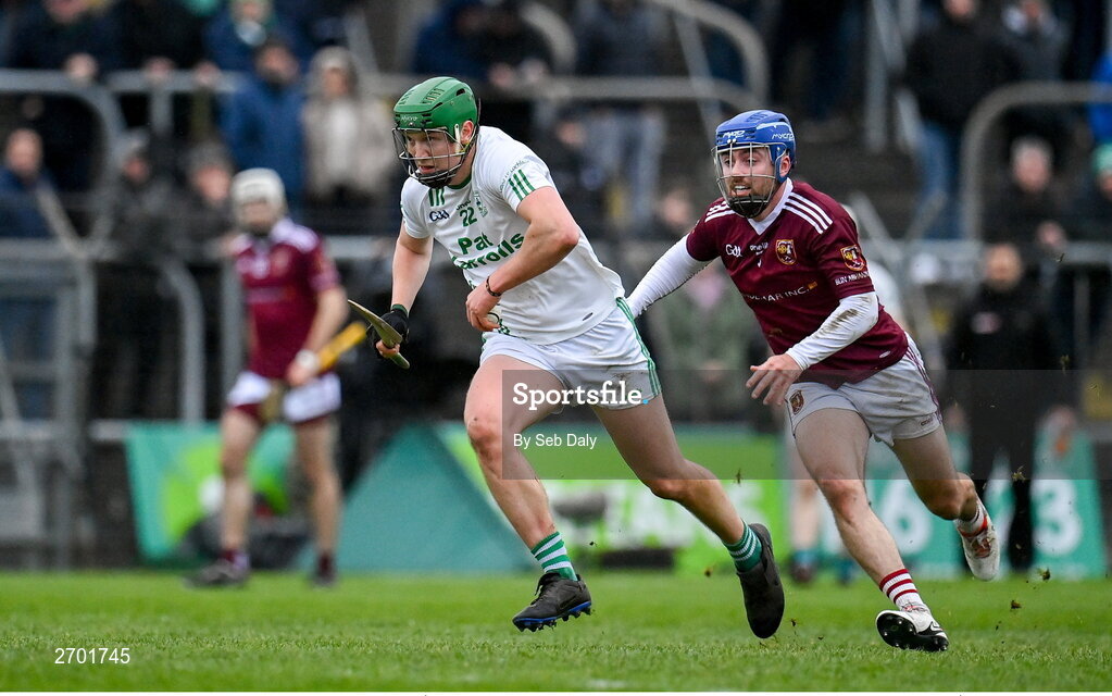 17 December 2023; Luke Hogan of O’Loughlin Gaels in action against Liam Gillan of Ruairí Óg Cushendall during the AIB GAA Hurling All-Ireland Club Championship semi-final match between O'Loughlin Gaels, Kilkenny, and Ruairí Óg Cushendall, Antrim, at Páirc Tailteann in Navan, Meath. Photo by Seb Daly/Sportsfile