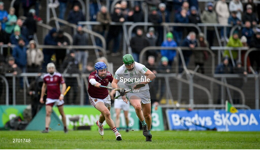 17 December 2023; Luke Hogan of O’Loughlin Gaels in action against Liam Gillan of Ruairí Óg Cushendall during the AIB GAA Hurling All-Ireland Club Championship semi-final match between O'Loughlin Gaels, Kilkenny, and Ruairí Óg Cushendall, Antrim, at Páirc Tailteann in Navan, Meath. Photo by Seb Daly/Sportsfile