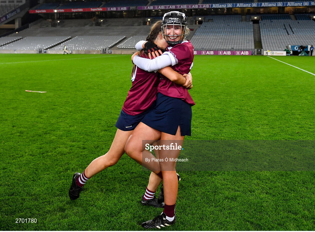 17 December 2023; Dicksboro players Rose Kelly, right, and Eva Healy celebrate after their side's victory in the AIB Camogie All-Ireland Senior Club Championship final match between Dicksboro of Kilkenny and Sarsfields of Galway at Croke Park in Dublin. Photo by Piaras Ó Mídheach/Sportsfile