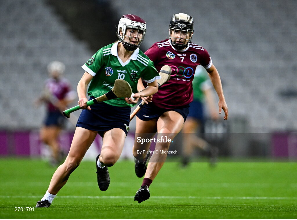 17 December 2023; Klara Donohue of Sarsfields in action against Ciara Phelan of Dicksboro during the AIB Camogie All-Ireland Senior Club Championship final match between Dicksboro of Kilkenny and Sarsfields of Galway at Croke Park in Dublin. Photo by Piaras Ó Mídheach/Sportsfile