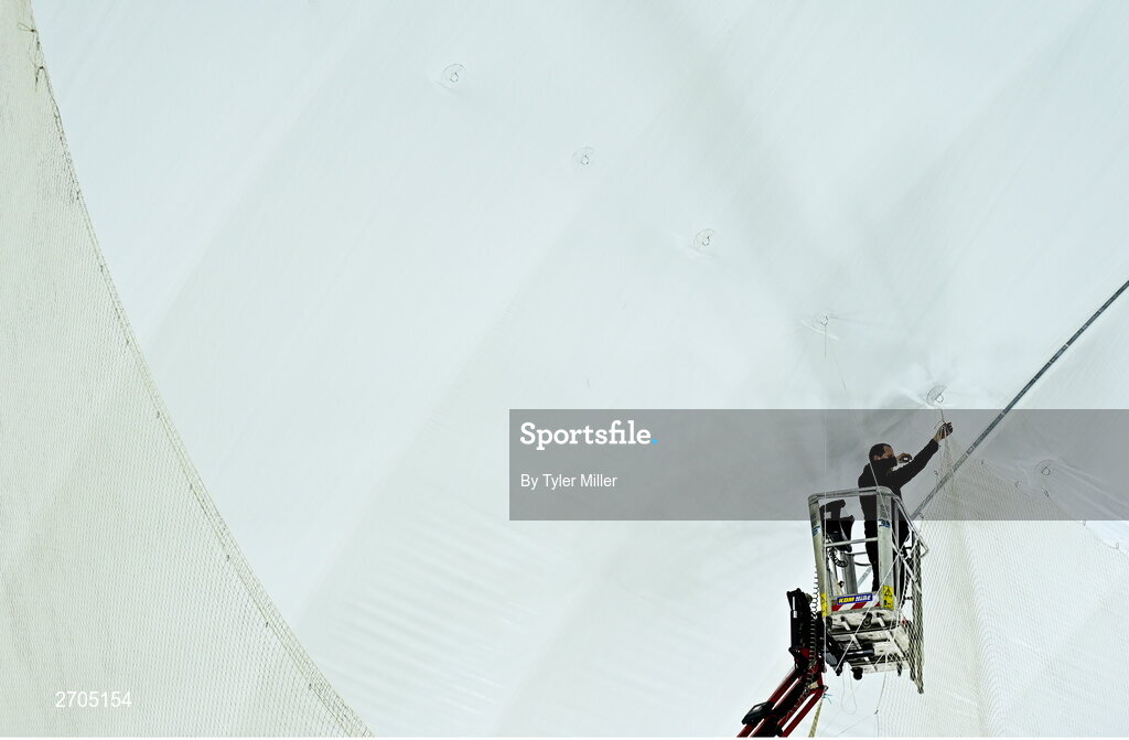 4 January 2024; Crane Operator Johnny Trimble repairs the net before the Connacht Hurling League semi-final match between Galway and New York at University of Galway Connacht GAA AirDome in Bekan, Mayo. Photo by Tyler Miller/Sportsfile