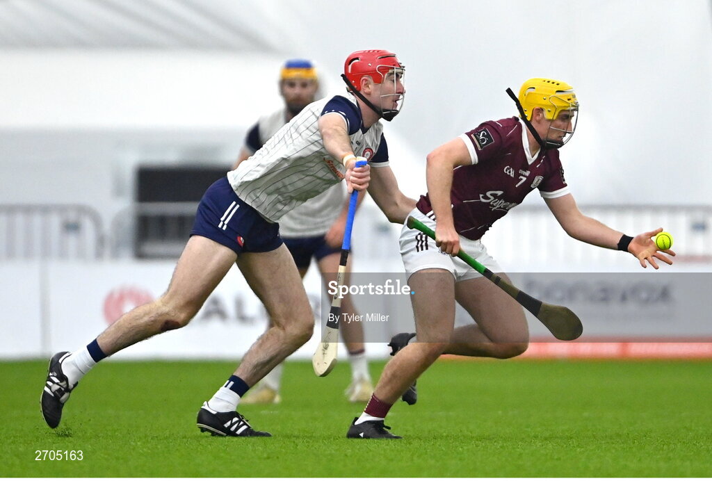 4 January 2024; Micheál Lyons of Galway in action against AJ Willis of New York during the Connacht Hurling League semi-final match between Galway and New York at University of Galway Connacht GAA AirDome in Bekan, Mayo. Photo by Tyler Miller/Sportsfile