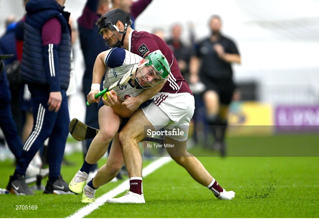 4 January 2024; Aidan Organ of New York is tackled by MacDara Ó'Bearra of Galway during the Connacht Hurling League semi-final match between Galway and New York at University of Galway Connacht GAA AirDome in Bekan, Mayo. Photo by Tyler Miller/Sportsfile