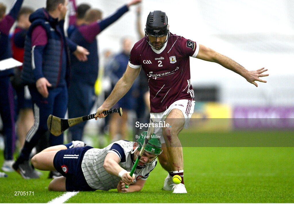 4 January 2024; Aidan Organ of New York is tackled by MacDara Ó'Bearra of Galway during the Connacht Hurling League semi-final match between Galway and New York at University of Galway Connacht GAA AirDome in Bekan, Mayo. Photo by Tyler Miller/Sportsfile