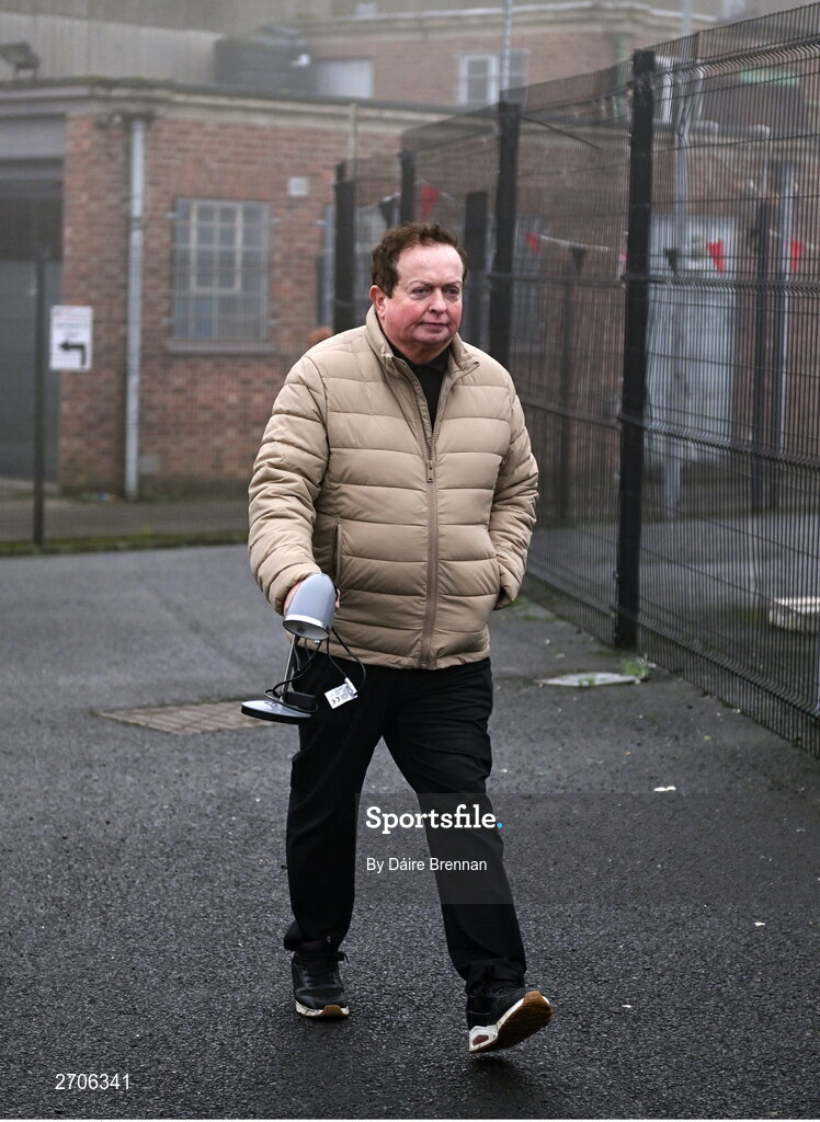 7 January 2024; RTÉ commentator Marty Morrissey arrives with a lamp ahead of the AIB GAA Football All-Ireland Senior Club Championship semi-final match between Kilmacud Crokes of Dublin, and Glen of Derry, at Páirc Esler in Newry, Down. Photo by Daire Brennan/Sportsfile