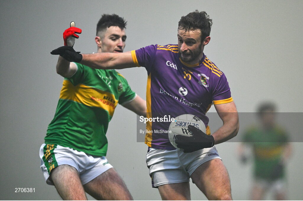 7 January 2024; Shane Horan of Kilmacud Crokes is tackled by Danny Tallon of Glen during the AIB GAA Football All-Ireland Senior Club Championship semi-final match between Kilmacud Crokes of Dublin, and Glen of Derry, at Páirc Esler in Newry, Down. Photo by Ben McShane/Sportsfile