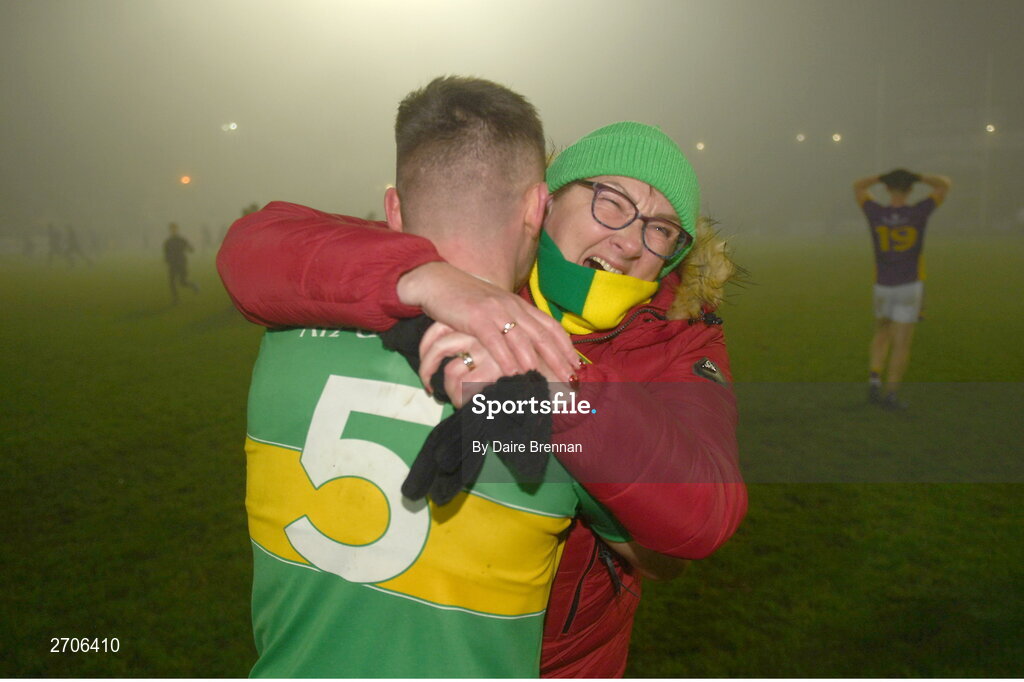 7 January 2024; Eunan Mulholland of Glen celebrates with a supporter after the AIB GAA Football All-Ireland Senior Club Championship semi-final match between Kilmacud Crokes of Dublin, and Glen of Derry, at Páirc Esler in Newry, Down. Photo by Daire Brennan/Sportsfile