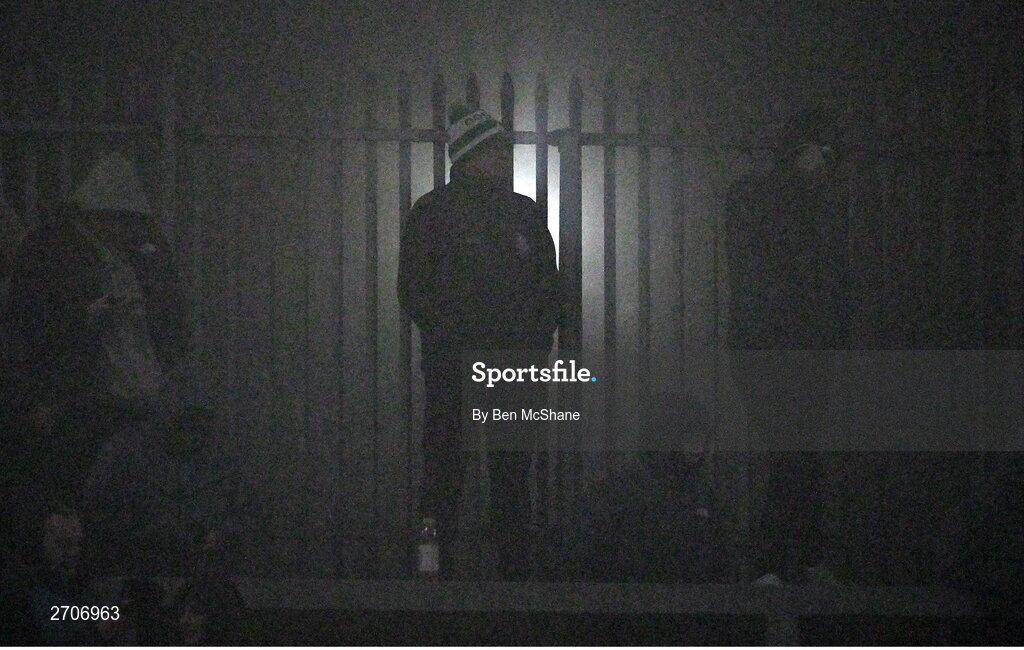 7 January 2024; A supporter looks on from the fog during the AIB GAA Football All-Ireland Senior Club Championship semi-final match between Kilmacud Crokes of Dublin, and Glen of Derry, at Páirc Esler in Newry, Down. Photo by Ben McShane/Sportsfile