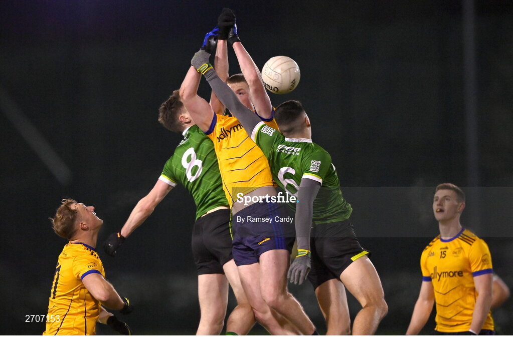 9 January 2024; Matthew Costello of DCU in action against Joe McDaid, 8, and Rory Donnelly of Queens during the Electric Ireland Higher Education GAA Sigerson Cup Round 1 match between Queens University Belfast and DCU at The Dub at Queen’s Sport in Belfast. Photo by Ramsey Cardy/Sportsfile