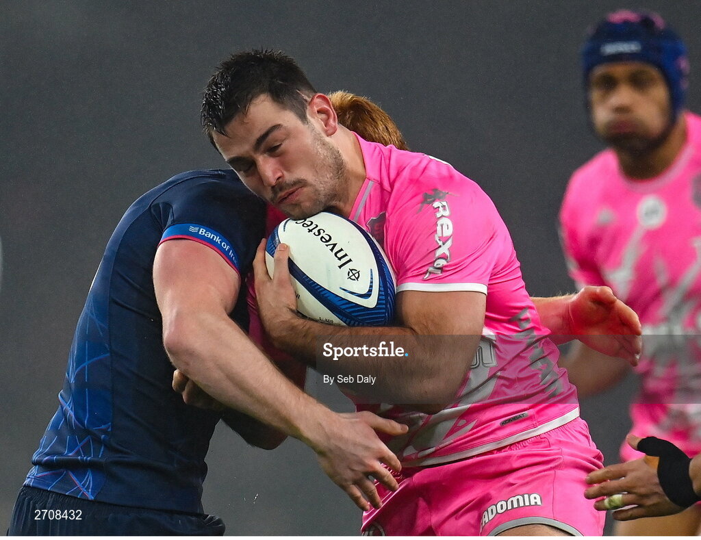 13 January 2024; Lucas Peyresblanques of Stade Francais is tackled by Ciarán Frawley of Leinster during the Investec Champions Cup Pool 4 Round 3 match between Leinster and Stade Francais at the Aviva Stadium in Dublin. Photo by Seb Daly/Sportsfile