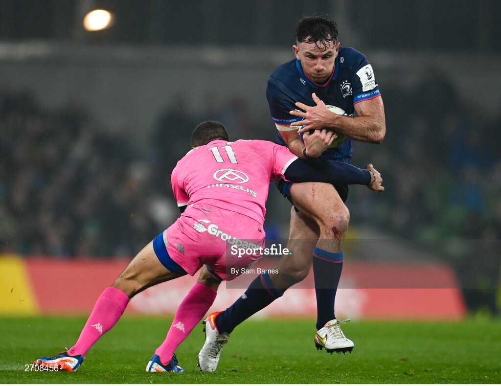 13 January 2024; Hugo Keenan of Leinster is tackled by Kylan Hamdaoui of Stade Francais during the Investec Champions Cup Pool 4 Round 3 match between Leinster and Stade Francais at the Aviva Stadium in Dublin. Photo by Sam Barnes/Sportsfile