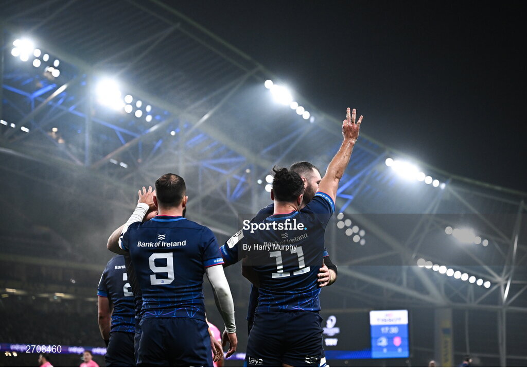 13 January 2024; James Lowe of Leinster, 11, celebrates with teammates after scoring his side's first try  during the Investec Champions Cup Pool 4 Round 3 match between Leinster and Stade Francais at the Aviva Stadium in Dublin. Photo by Harry Murphy/Sportsfile