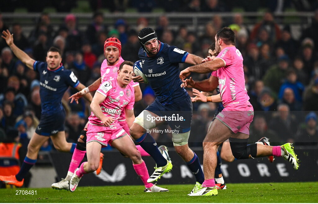 13 January 2024; Caelan Doris of Leinster evades the tackle of Lucas Peyresblanques of Stade Francais during the Investec Champions Cup Pool 4 Round 3 match between Leinster and Stade Francais at the Aviva Stadium in Dublin. Photo by Harry Murphy/Sportsfile