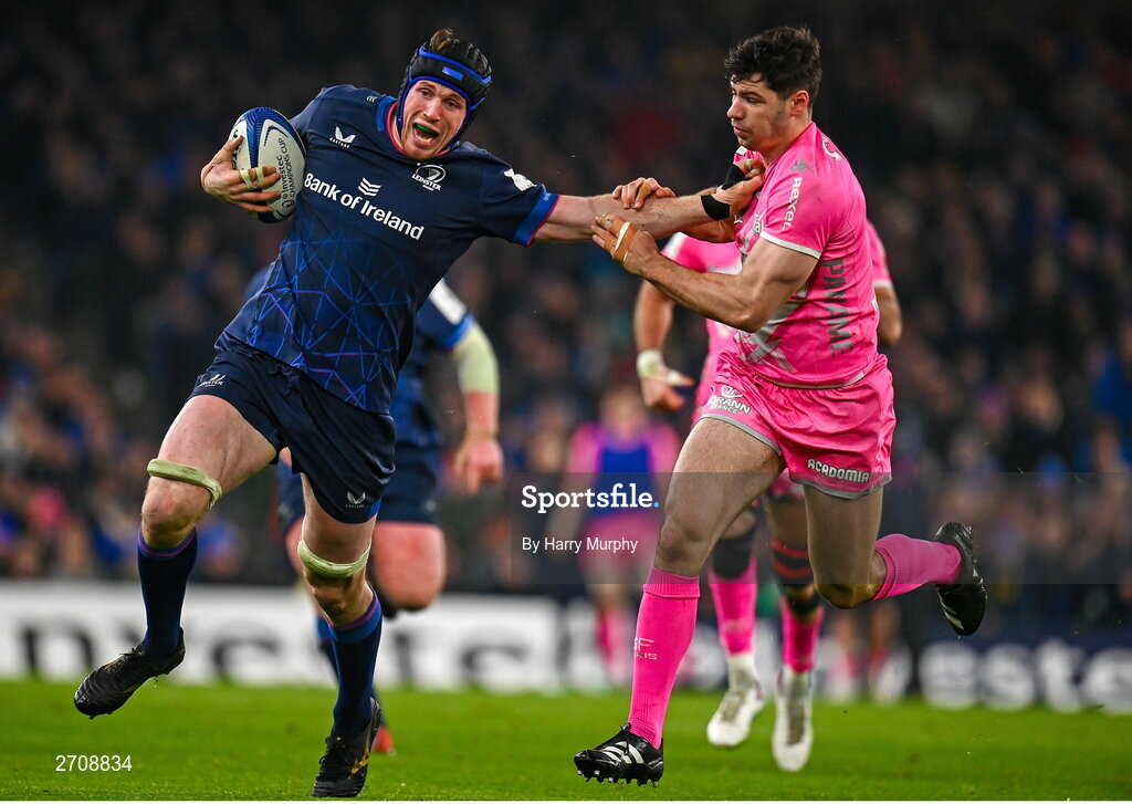 13 January 2024; Ryan Baird of Leinster is tackled by Leo Monin of Stade Francais during the Investec Champions Cup Pool 4 Round 3 match between Leinster and Stade Francais at the Aviva Stadium in Dublin. Photo by Harry Murphy/Sportsfile