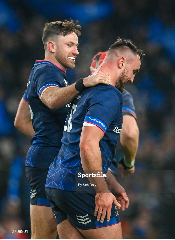 13 January 2024; Rónan Kelleher of Leinster, right, is congratulated by teammate Hugo Keenan after assisting his side's seventh try during the Investec Champions Cup Pool 4 Round 3 match between Leinster and Stade Francais at the Aviva Stadium in Dublin. Photo by Seb Daly/Sportsfile