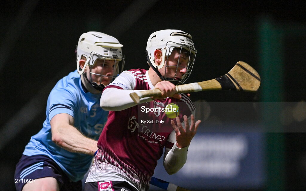 18 January 2024; Colm Molloy of University of Galway in action against Michael Dundon of SETU Carlow during the Electric Ireland Higher Education GAA Fitzgibbon Cup Round 1 match between SETU Carlow and University of Galway at SETU Carlow Sport Complex in Carlow. Photo by Seb Daly/Sportsfile