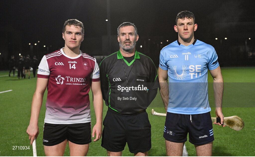 18 January 2024; Referee James Owens with team captains Conor Walsh of University of Galway and Eoin Cody of SETU Carlow before the Electric Ireland Higher Education GAA Fitzgibbon Cup Round 1 match between SETU Carlow and University of Galway at SETU Carlow Sport Complex in Carlow. Photo by Seb Daly/Sportsfile