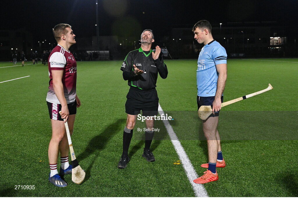 18 January 2024; Referee James Owens with team captains Conor Walsh of University of Galway and Eoin Cody of SETU Carlow before the Electric Ireland Higher Education GAA Fitzgibbon Cup Round 1 match between SETU Carlow and University of Galway at SETU Carlow Sport Complex in Carlow. Photo by Seb Daly/Sportsfile