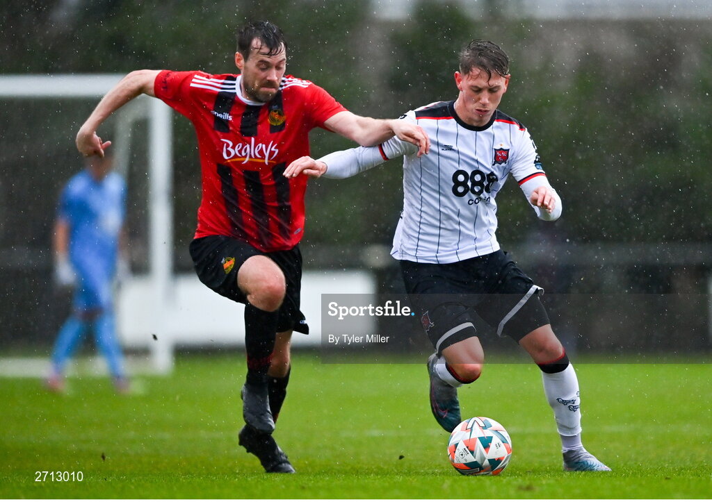 21 January 2024; Hayden Muller of Dundalk in action against Stephen Cleary of Malahide United AFC during the PTSB Leinster Senior Cup Group A match between Malahide United and Dundalk at Gannon Park in Malahide, Dublin. Photo by Tyler Miller/Sportsfile