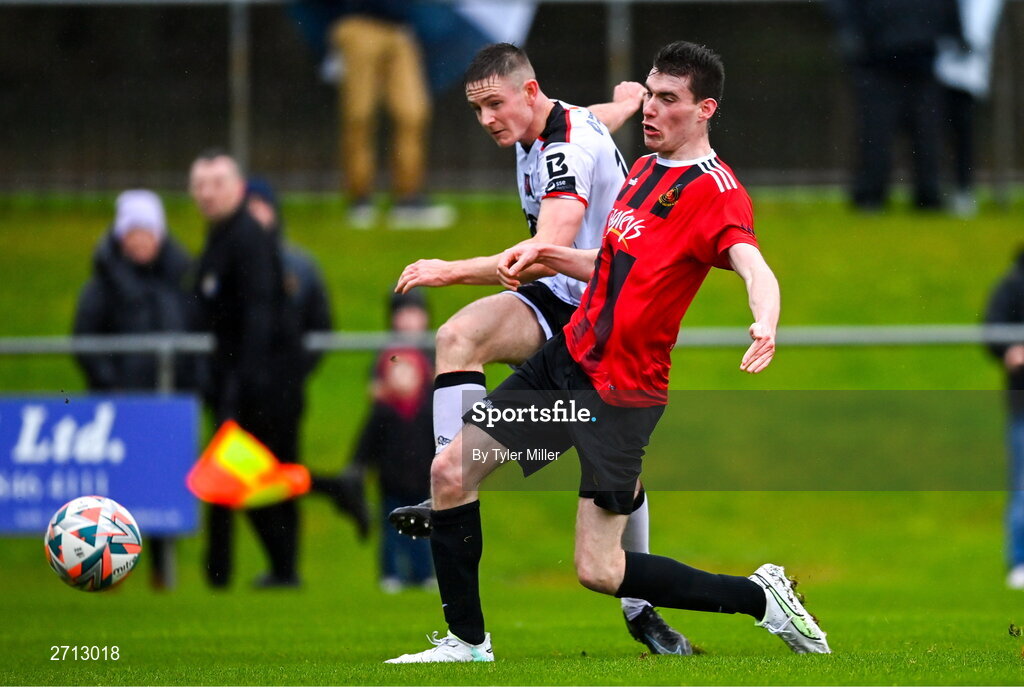 21 January 2024; Cameron Elliot of Dundalk in action against Thomas Lynch of Malahide United AFC during the PTSB Leinster Senior Cup Group A match between Malahide United and Dundalk at Gannon Park in Malahide, Dublin. Photo by Tyler Miller/Sportsfile