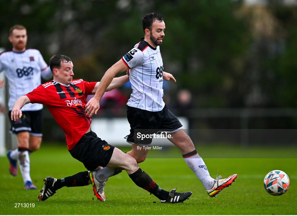 21 January 2024; Robert Benson of Dundalk is tackled by Mark Cassidy of Malahide United AFC during the PTSB Leinster Senior Cup Group A match between Malahide United and Dundalk at Gannon Park in Malahide, Dublin. Photo by Tyler Miller/Sportsfile