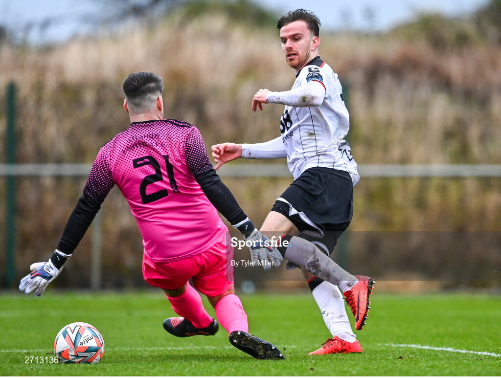21 January 2024; Archie Davies of Dundalk shoots to score his side's third goal during the PTSB Leinster Senior Cup Group A match between Malahide United and Dundalk at Gannon Park in Malahide, Dublin. Photo by Tyler Miller/Sportsfile