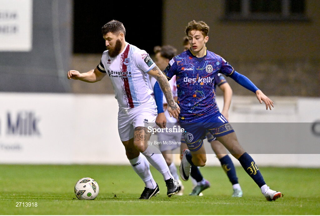 22 January 2024; Gary Deegan of Drogheda United in action against Hugh Smith of Bohemians during the PTSB Leinster Senior Cup Group A match between Drogheda United and Bohemians at Weaver's Park in Drogheda, Louth. Photo by Ben McShane/Sportsfile