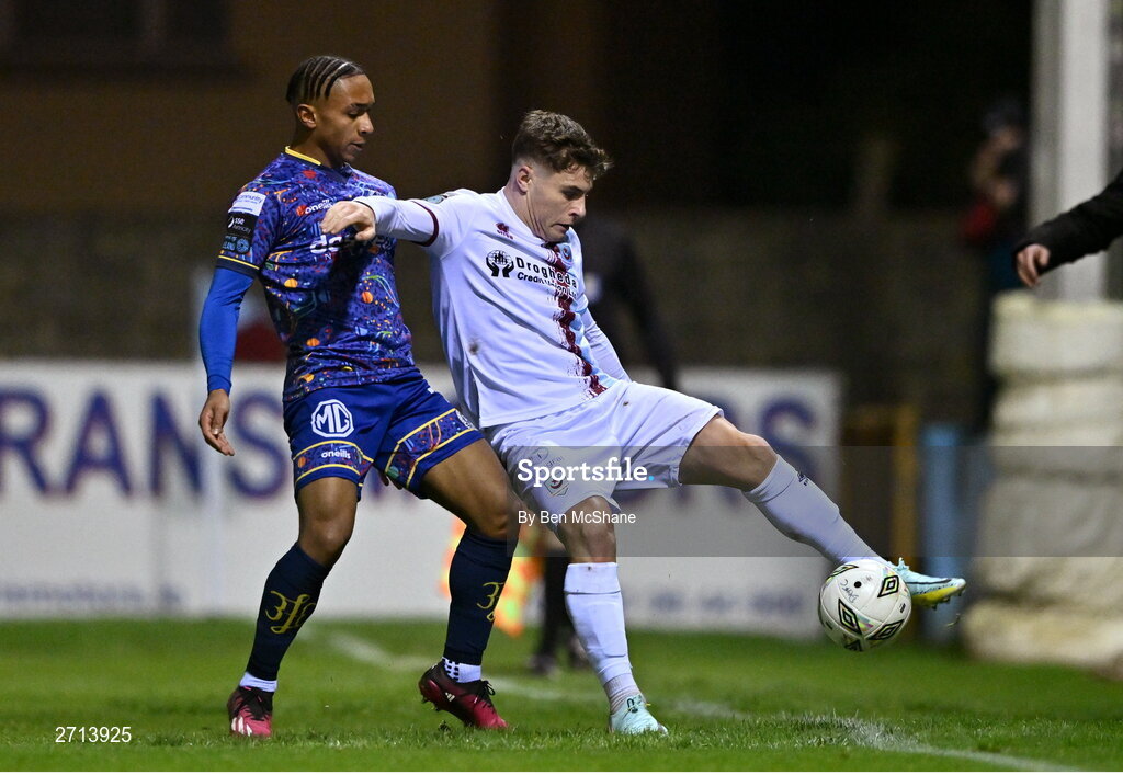22 January 2024; Aaron McNally of Drogheda United in action against Viktors Ohvovoriole of Bohemians during the PTSB Leinster Senior Cup Group A match between Drogheda United and Bohemians at Weaver's Park in Drogheda, Louth. Photo by Ben McShane/Sportsfile
