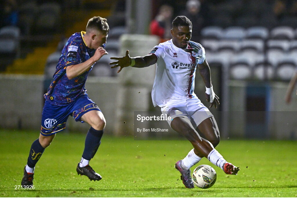22 January 2024; Frantz Pierrot of Drogheda United in action against Josh Lyons of Bohemians during the PTSB Leinster Senior Cup Group A match between Drogheda United and Bohemians at Weaver's Park in Drogheda, Louth. Photo by Ben McShane/Sportsfile