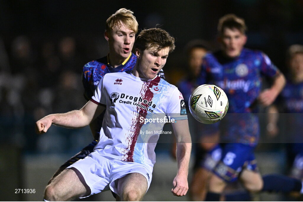 22 January 2024; Conor Kane of Drogheda United in action against Finn Cowper Gray of Bohemians during the PTSB Leinster Senior Cup Group A match between Drogheda United and Bohemians at Weaver's Park in Drogheda, Louth. Photo by Ben McShane/Sportsfile