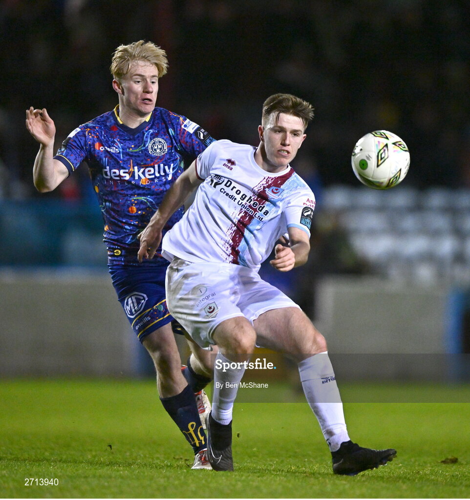 22 January 2024; Warren Davis of Drogheda United in action against Finn Cowper Gray of Bohemians during the PTSB Leinster Senior Cup Group A match between Drogheda United and Bohemians at Weaver's Park in Drogheda, Louth. Photo by Ben McShane/Sportsfile
