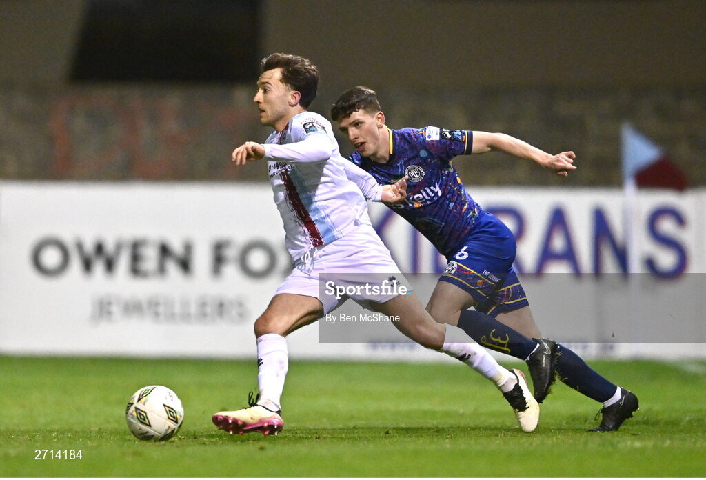 22 January 2024; Darragh Markey of Drogheda United and Sean Moore of Bohemians during the PTSB Leinster Senior Cup Group A match between Drogheda United and Bohemians at Weaver's Park in Drogheda, Louth. Photo by Ben McShane/Sportsfile
