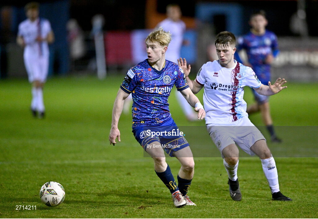 22 January 2024; Finn Cowper Gray of Bohemians and Warren Davis of Drogheda United during the PTSB Leinster Senior Cup Group A match between Drogheda United and Bohemians at Weaver's Park in Drogheda, Louth. Photo by Ben McShane/Sportsfile